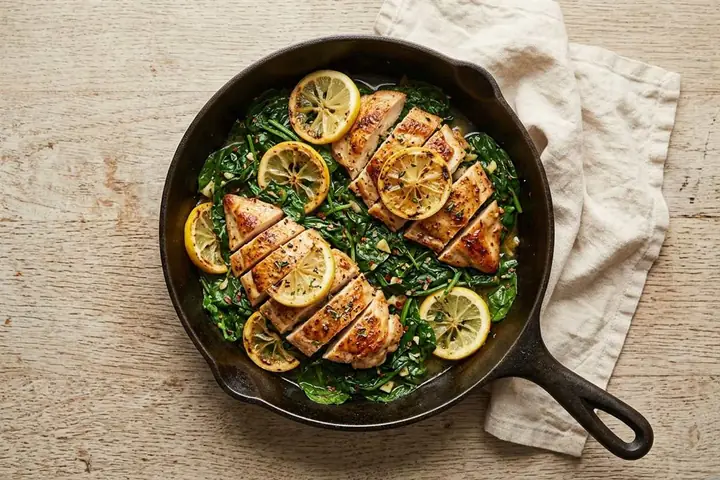 Lemon chicken with wilted spinach